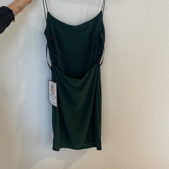 New !! decided to go with something else. But beautiful fitting backless dress - Picture 2 of 2